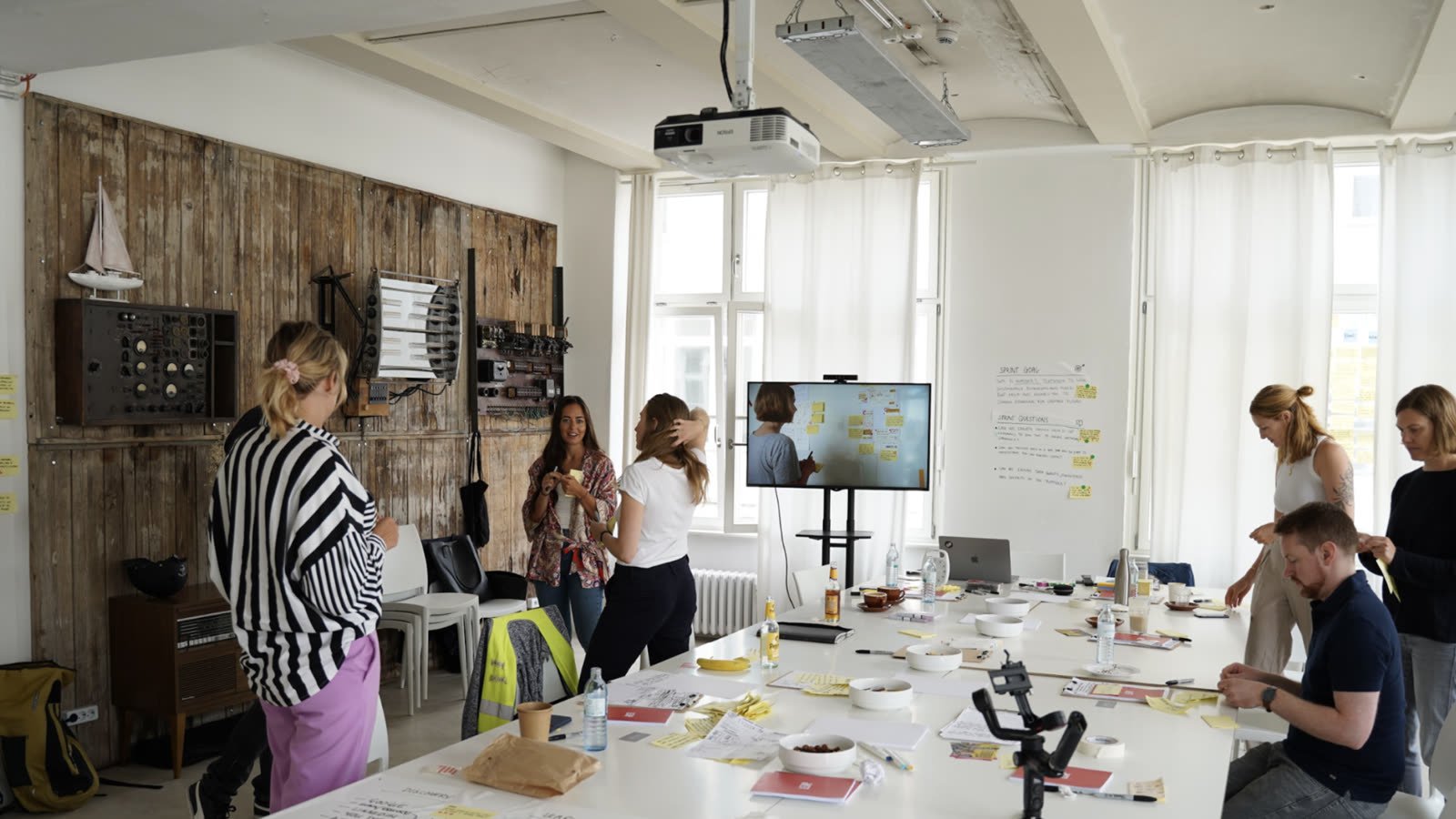 The discovery workshop room with sprint goal and questions on the wall